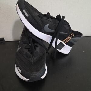 Nike Reposto Black Smoke Grey Woman's size 6.5 Running Shoe